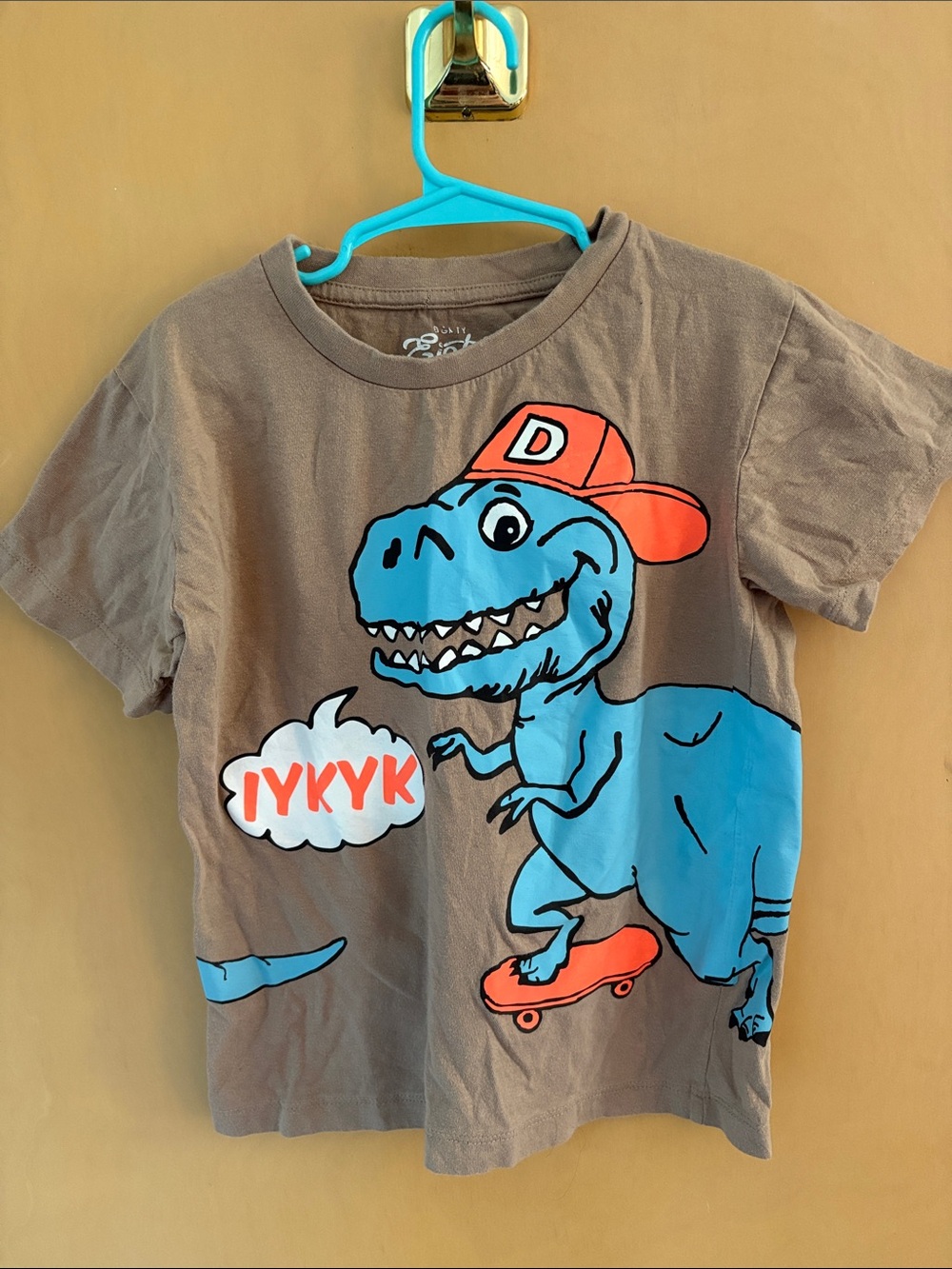 Kids Brown Tee with Blue Skateboarding Dino IYKYK- Eighty Eight Brand